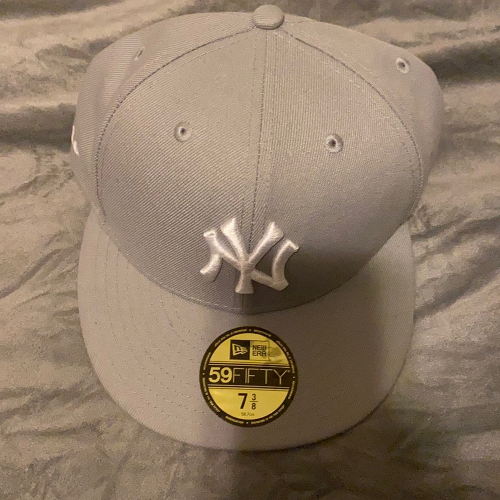 A grey baseball hat .